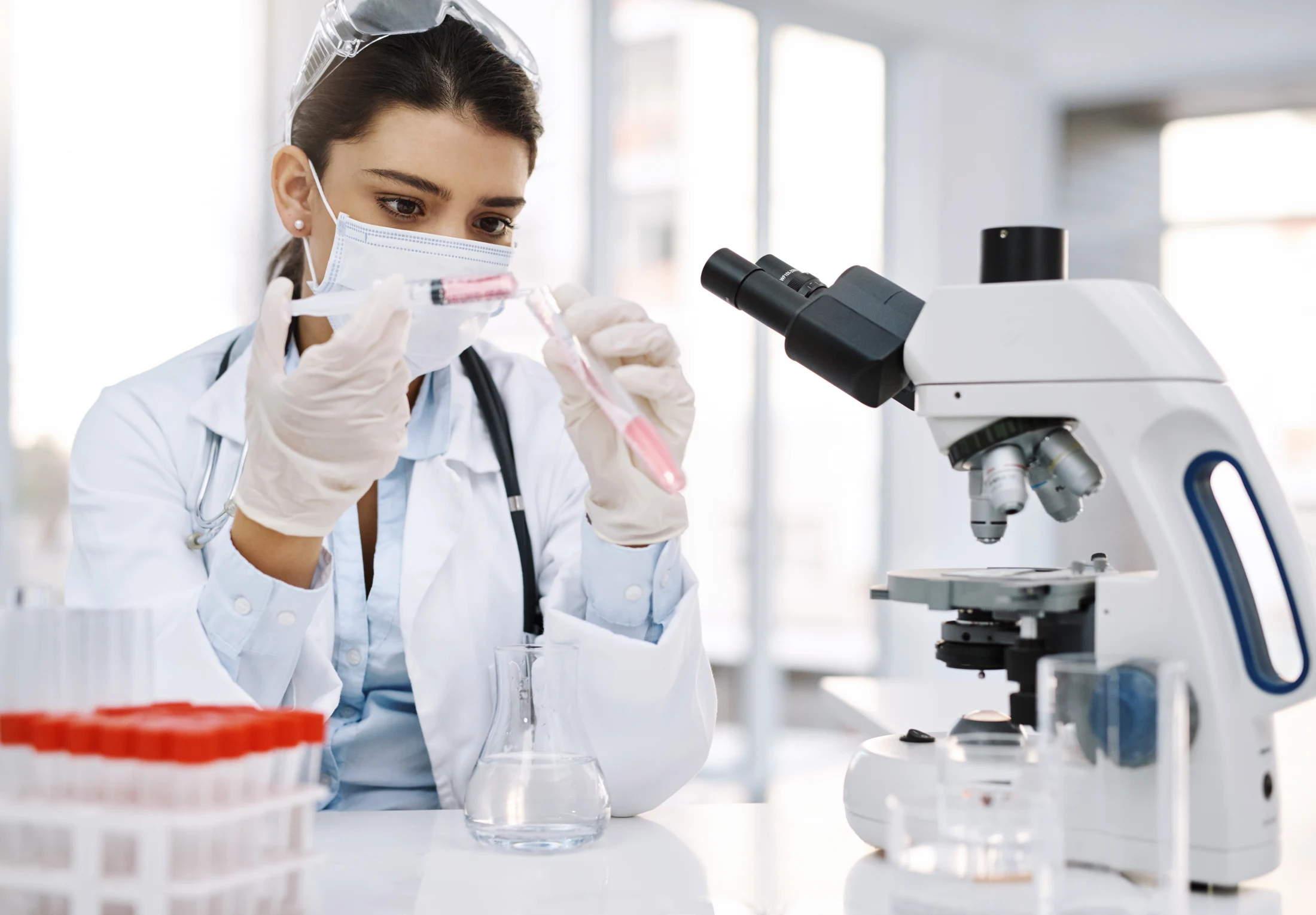 A laboratory researcher developing health and wellness formulations