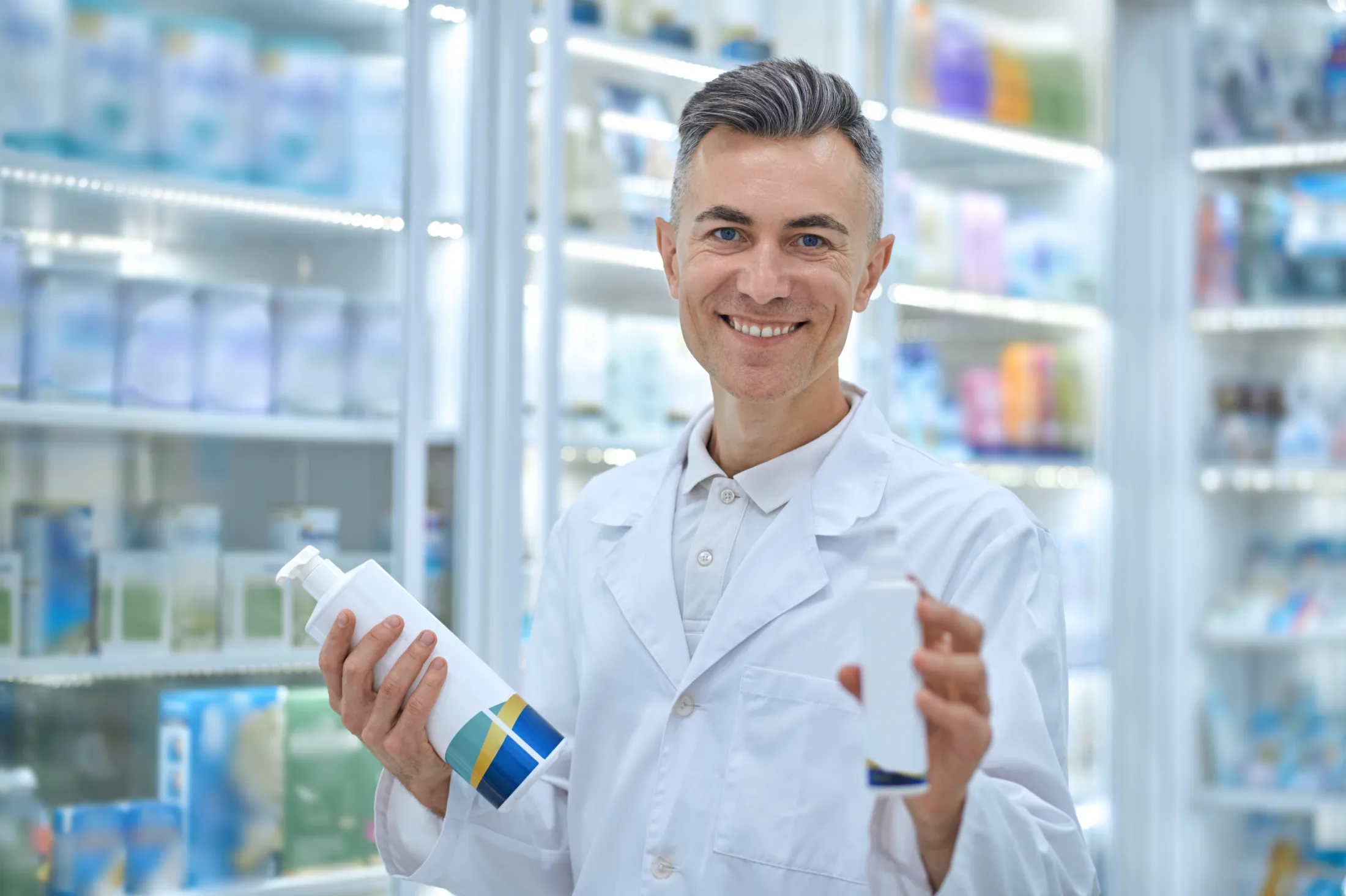 A pharmacy professional presenting a finished wellness product
