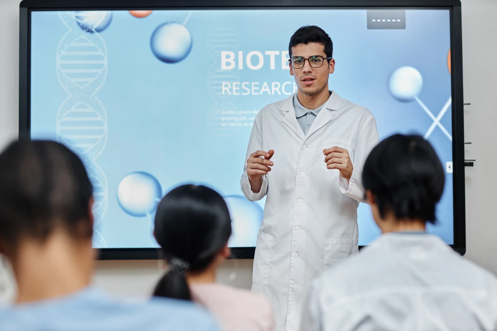Laboratory researchers collaborating on product development